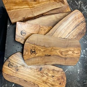 I am selling these olive wood cheese boards/ charcuterie boards/ cutting boards.